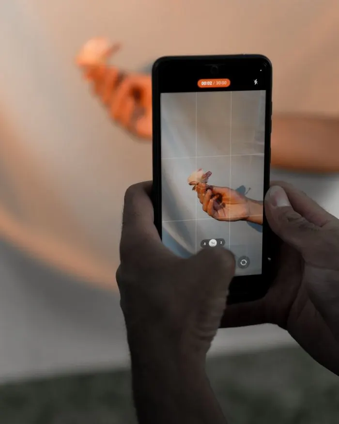 A phone filming a dancer during her performance